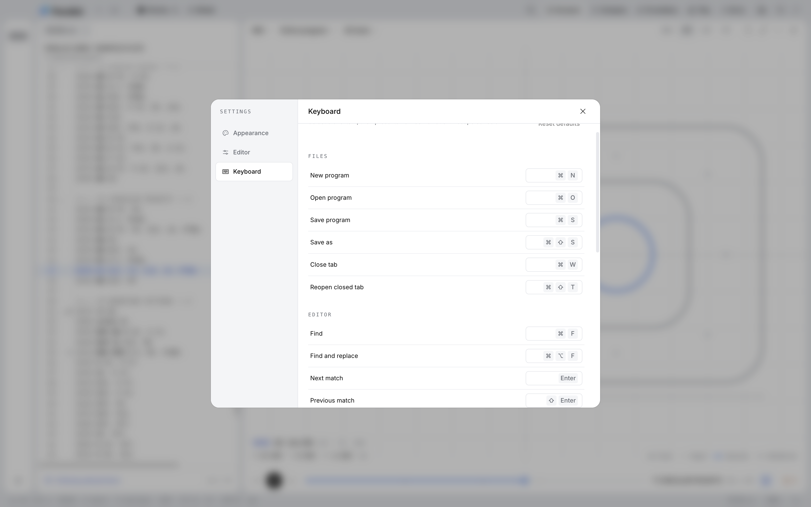 Keyboard settings: select a shortcut and press its new combination, with a Reset defaults button above the file shortcuts for New program, Open program, and Save program.